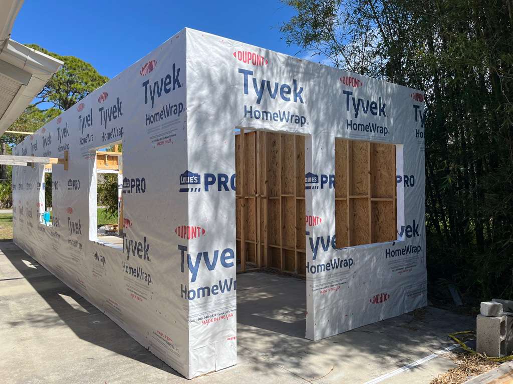 New ADU and garage addition construction with Tyvek wrap framing by Your Local GC in North Port FL
