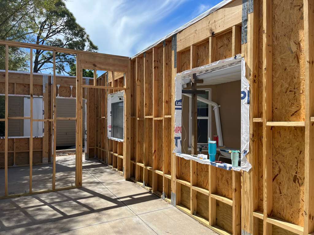 Bathroom construction with lumber framing and window install in North Port FL