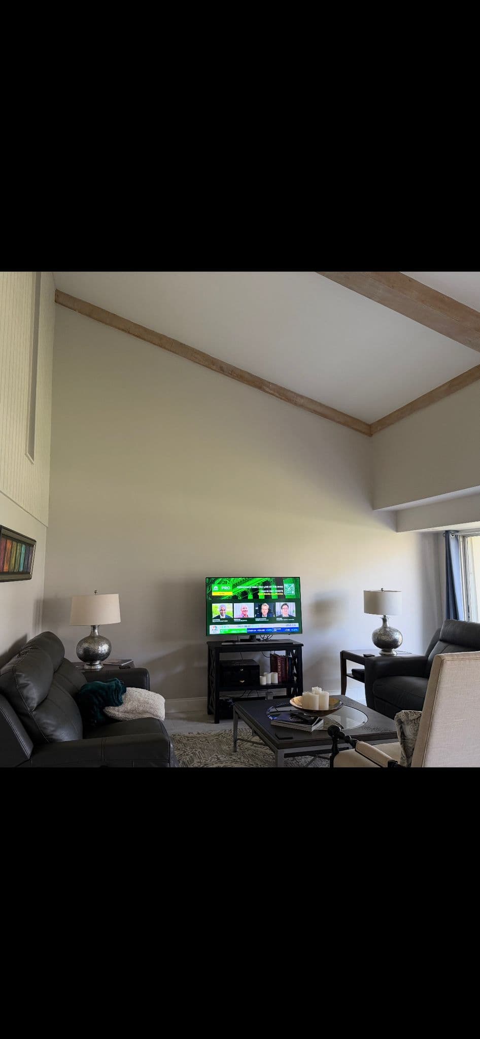 Living room remodel with exposed beam ceiling in North Port FL